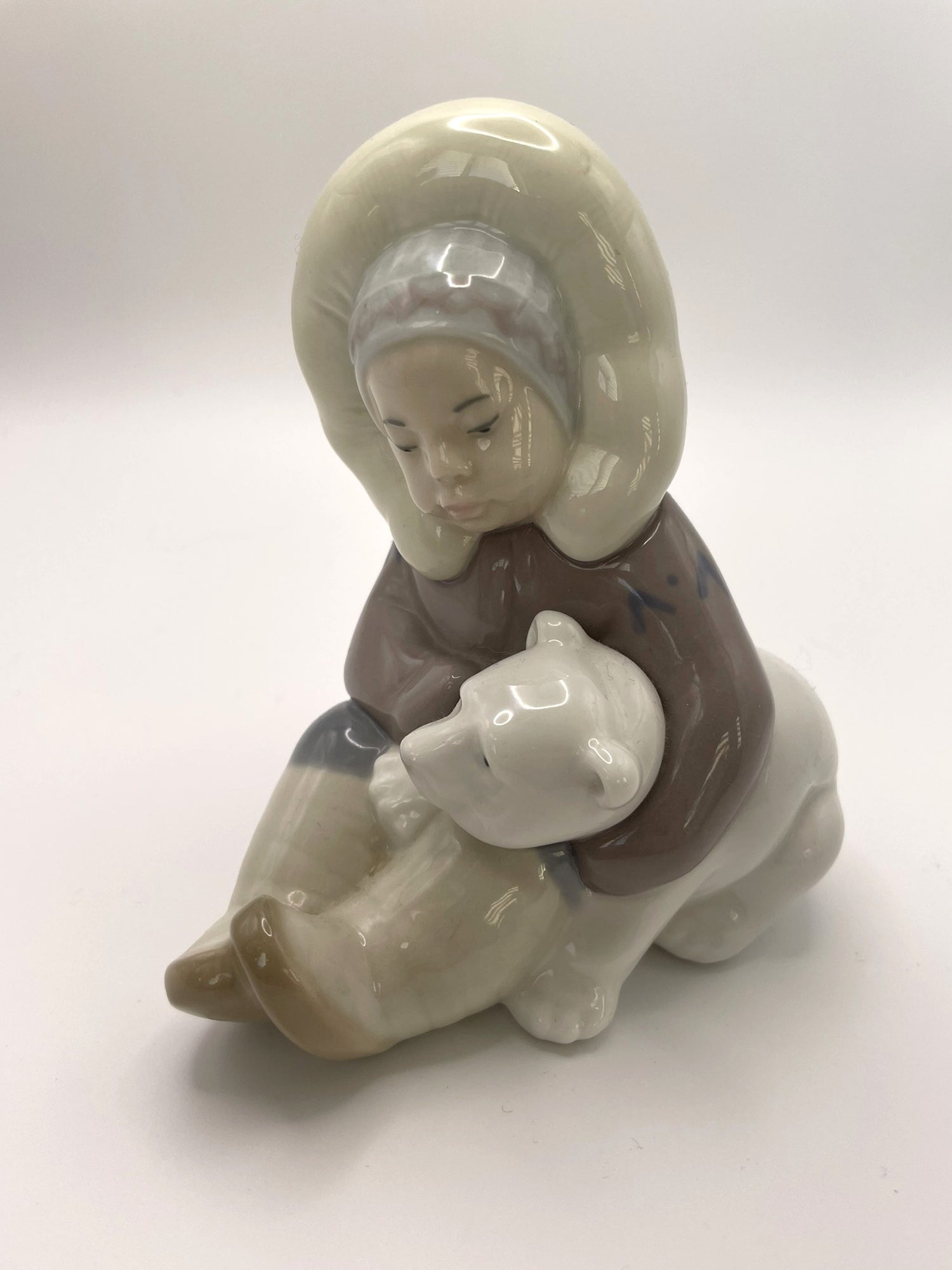 Lladró Cute Little Inuit Child Hugging A Polar Bear Cub