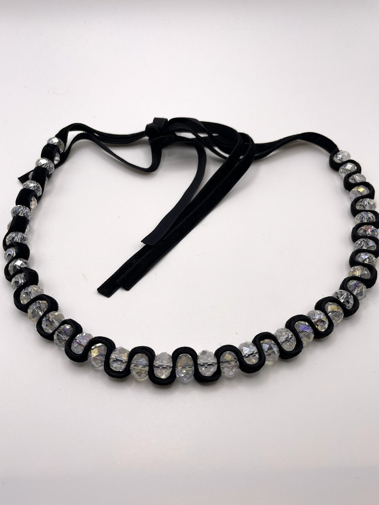 Divine Glass Beads Necklace With Aurora Borealis Finish Wrapped Around a Black Velvet Ribbon